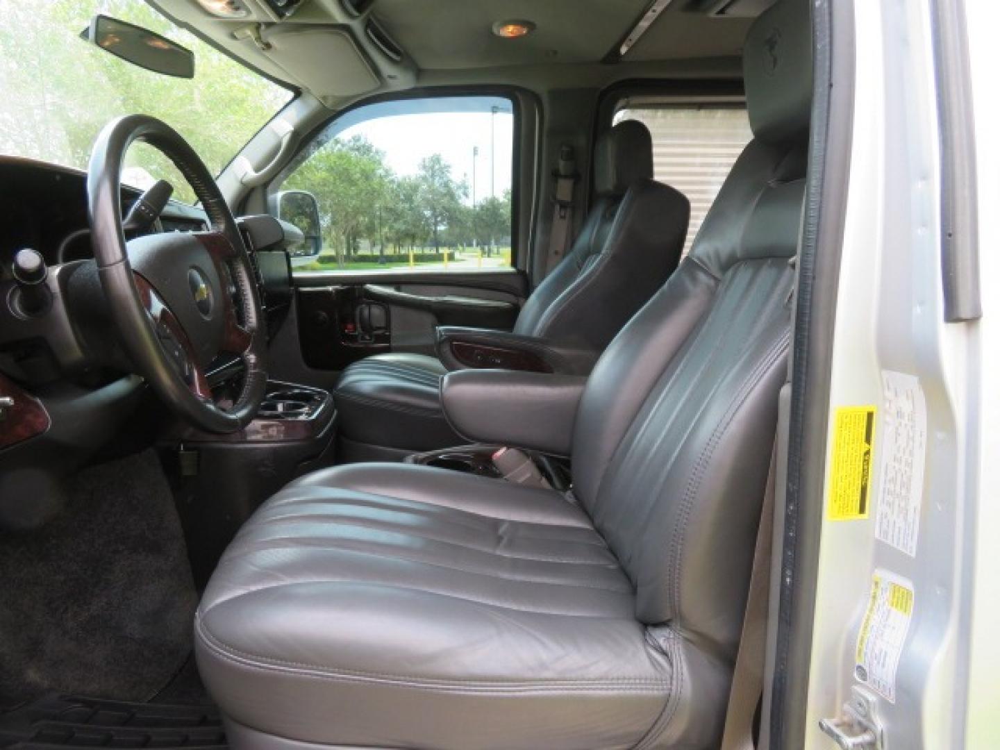 2014 Chevrolet Express (1GBWGLCG3E1) , located at 4301 Oak Circle #19, Boca Raton, FL, 33431, (954) 561-2499, 26.388861, -80.084038 - You are looking at a Rare 2014 Chevy Express 2500 Quigley 4x4 Four Wheel Drive Explorer Limited SE 9 Passenger Conversion Van with: 107K Original Miles, 6 Captain Chairs, Rear Power Folding Bench Seat Bed, Center Consoler Cooler, Front PPF (Paint Protection Film) Explorer Limited Conversion Througho - Photo#67